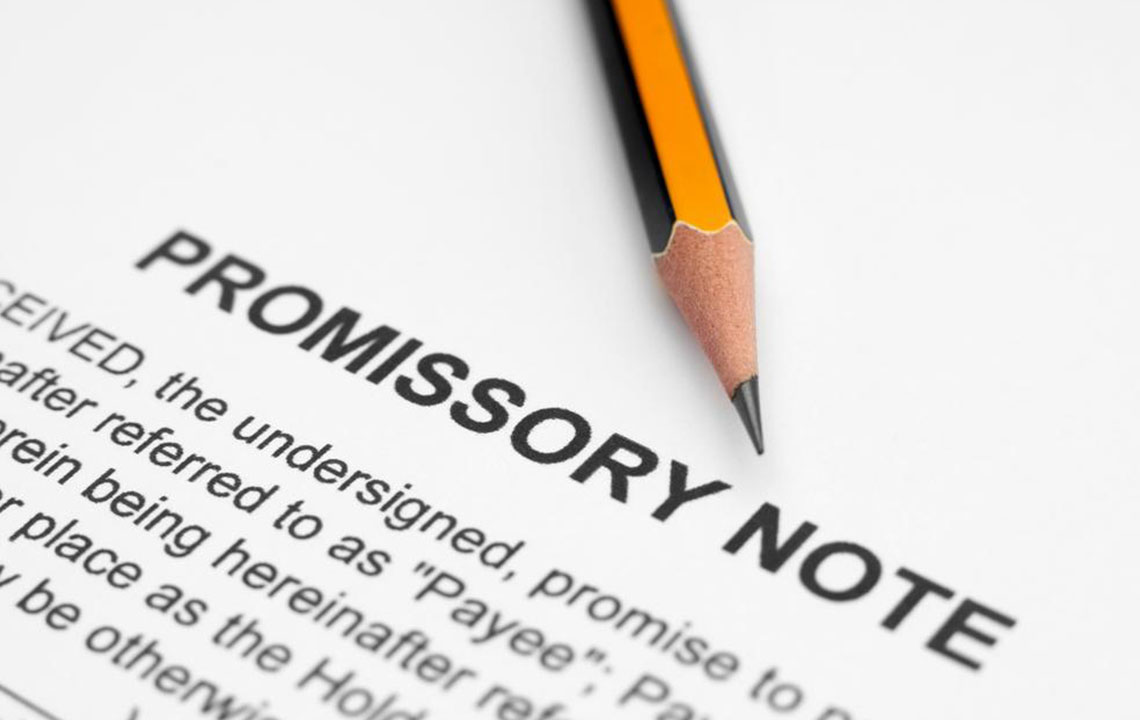 What should be included in a promissory note?